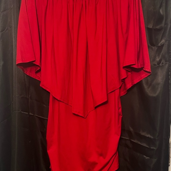 Red. Off the shoulder. Above the knee. Stretchy material. Size Medium (6-8) - Picture 2 of 2